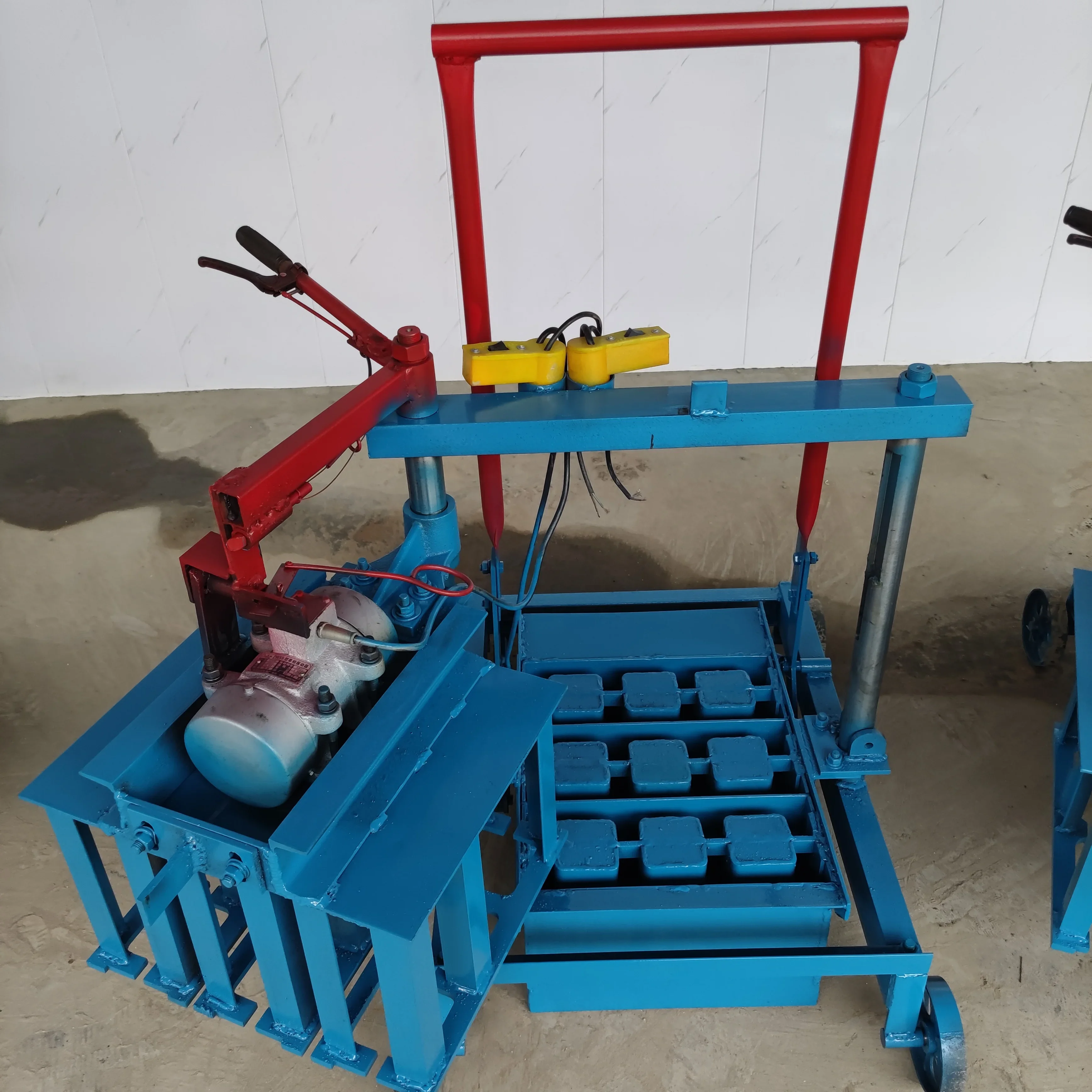 Small Mobile Manual Hollow Brick Block Maker Concrete Cement Brick Block Making Machinery Manufacturer