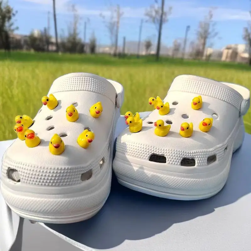 New Whole Set Hot Sale DIY Hole Shoes Charms for Little Yellow Duck Charms Designer Quality Garden Shoe Decoration Girl Gift