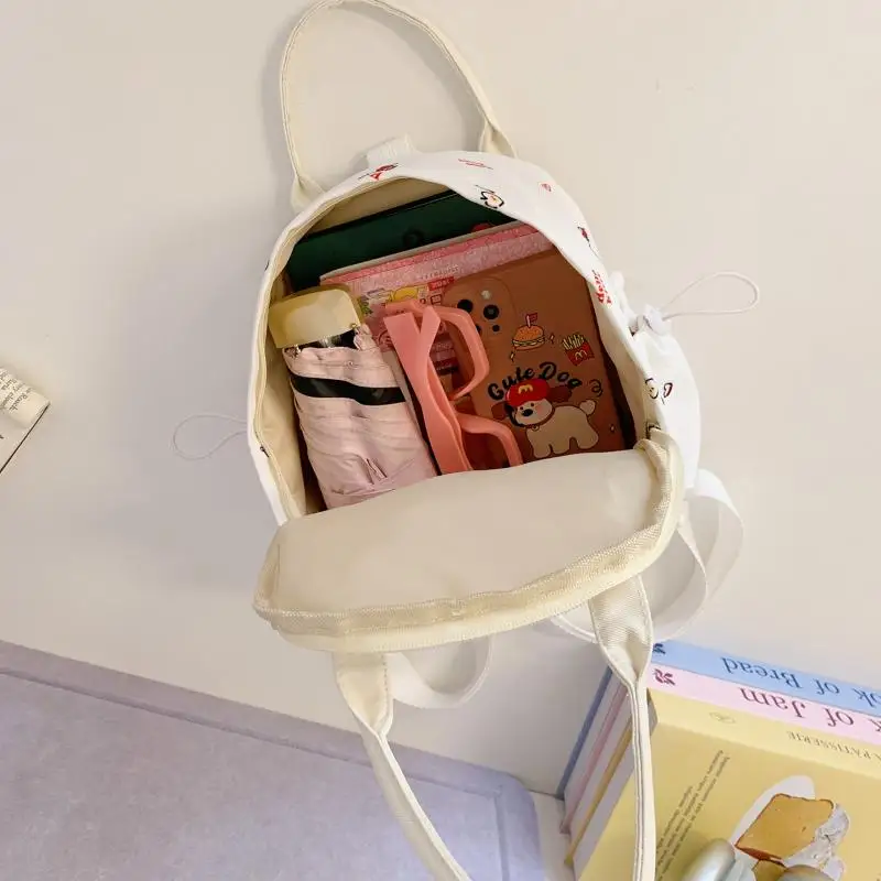 حقيبة ظهر Sanrio الجديدة المطبوعة برسوم كارتونية HelloKitty حقيبة ظهر عصرية كاجوال للفتيات Kawaii حقيبة كروس محمولة على ظهره للطلاب