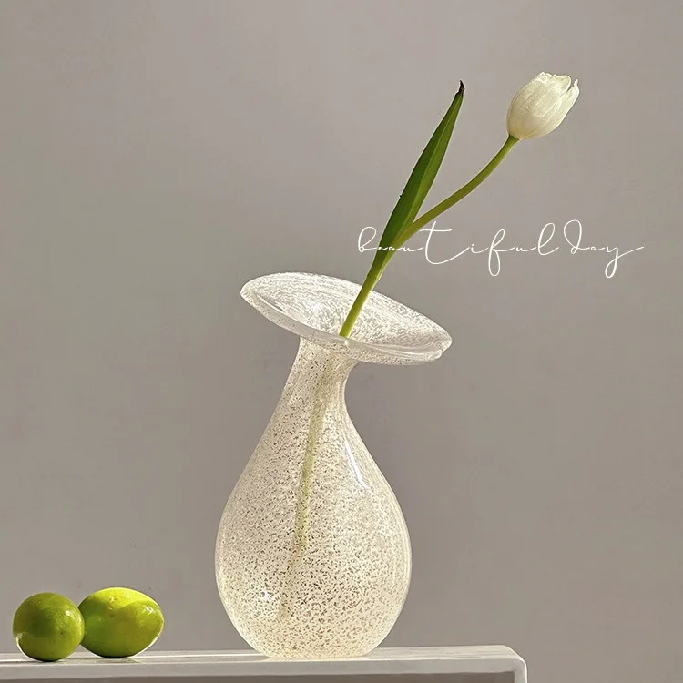 

White flowers, transparent glass, French romantic style, tulip flower arrangement, water nourishment, niche retro