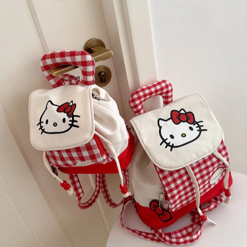 

Sanrio Hello Kitty Girls Mini Backpack Sweet Cute Cartoon Crossbody Bag School Bag Kawaii Red Plaid Double Shoulder Bag for Kids