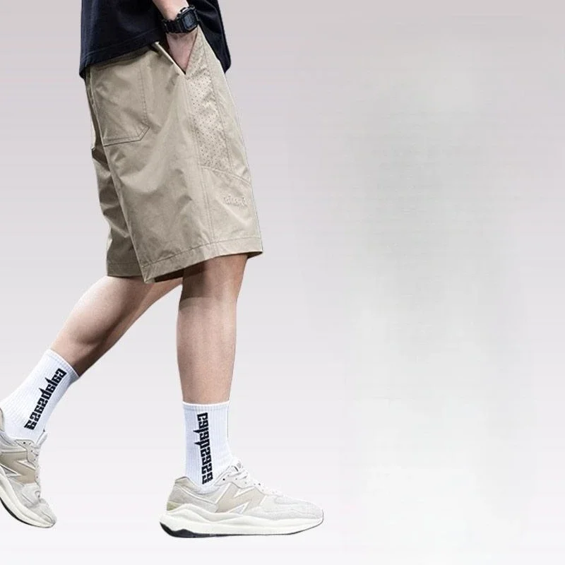 Celana Pendek Kargo Pria Panjang Solid Bermuda dengan Tali Tarik Celana Pendek Pinggang Setengah Elastis Longgar Lebar untuk Pria Desainer Saku