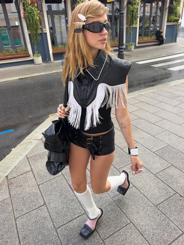 Women Black Sleeveless Lapel Faux Leather Cropped Top Single Breasted Fringe Patchwork Blouse 2026 New Casual Street Clothing