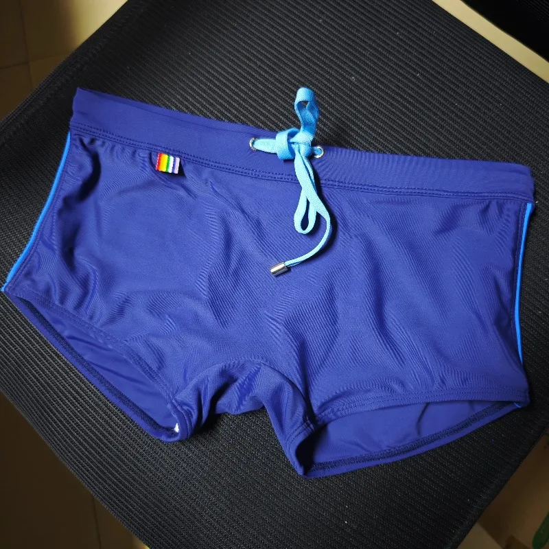 2026Combination fashion European foreign trade fashion color bar elements triangular beach swimming trunks simple UXH041