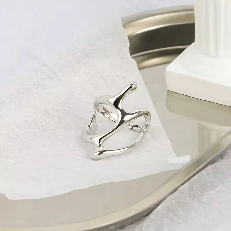 A Creative Punk-style Hollow Geometric Irregular Melting Electroplated Gold Adjustable Opening Ring For Teenagers, Suitable For