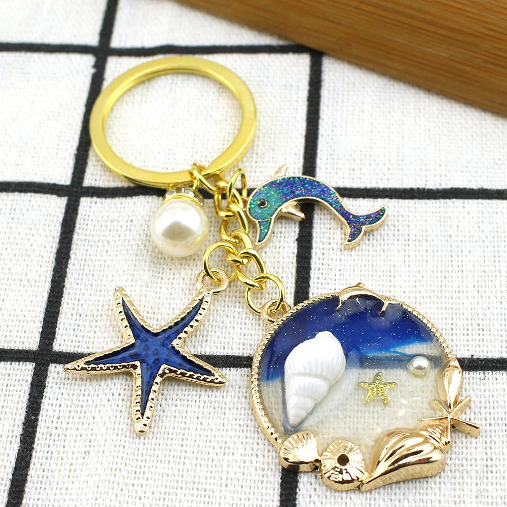 Neue Seestern Muschel Delphin Perle Emaille Schlüsselanhänger Schöne Meer Strand Anhänger Handgemachte DIY Erkenntnisse Unterwasser Schmuck Geschenk