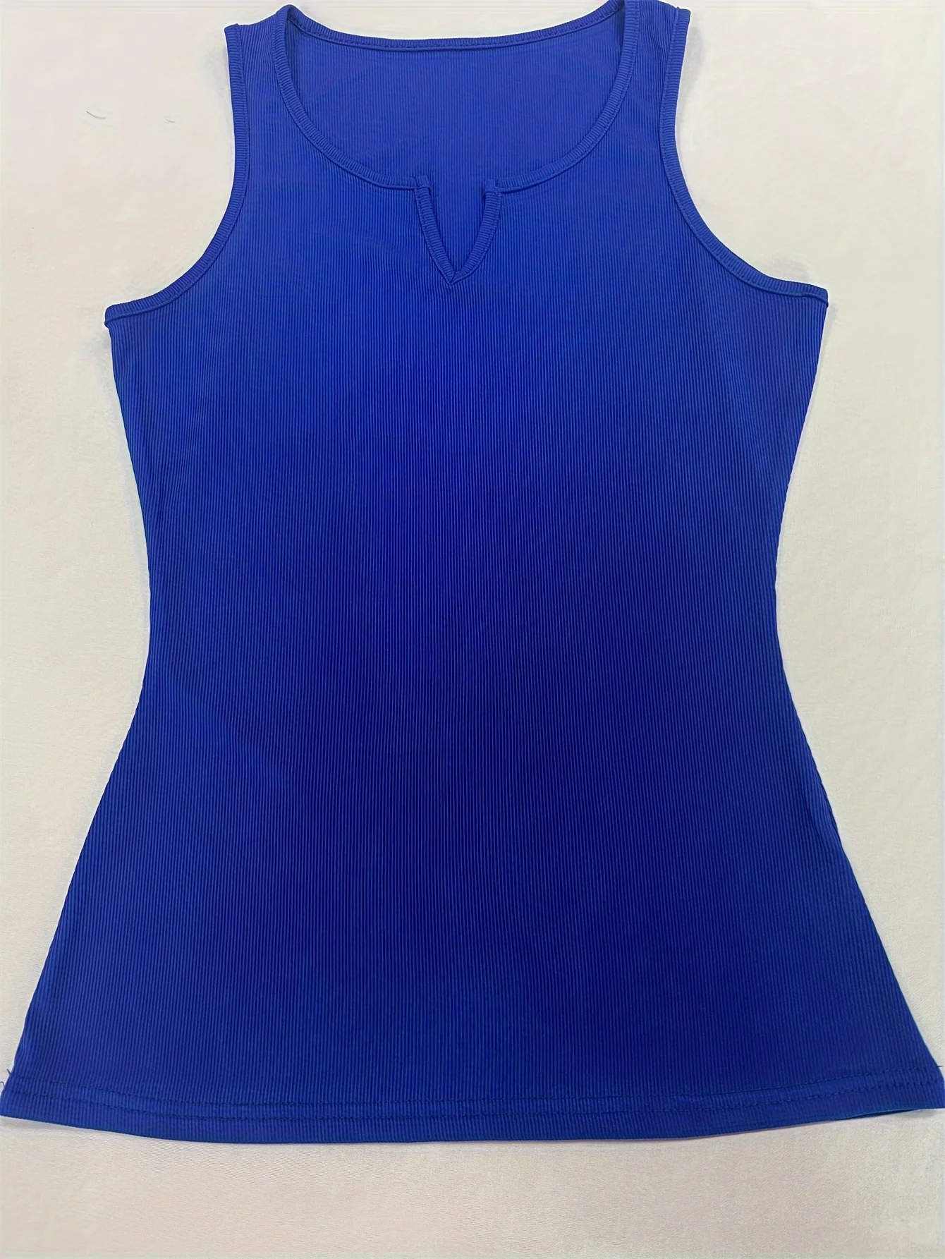 Versatile, fashionable, solid color, sexy V-neck vest with a herringbone women\'s top underneath