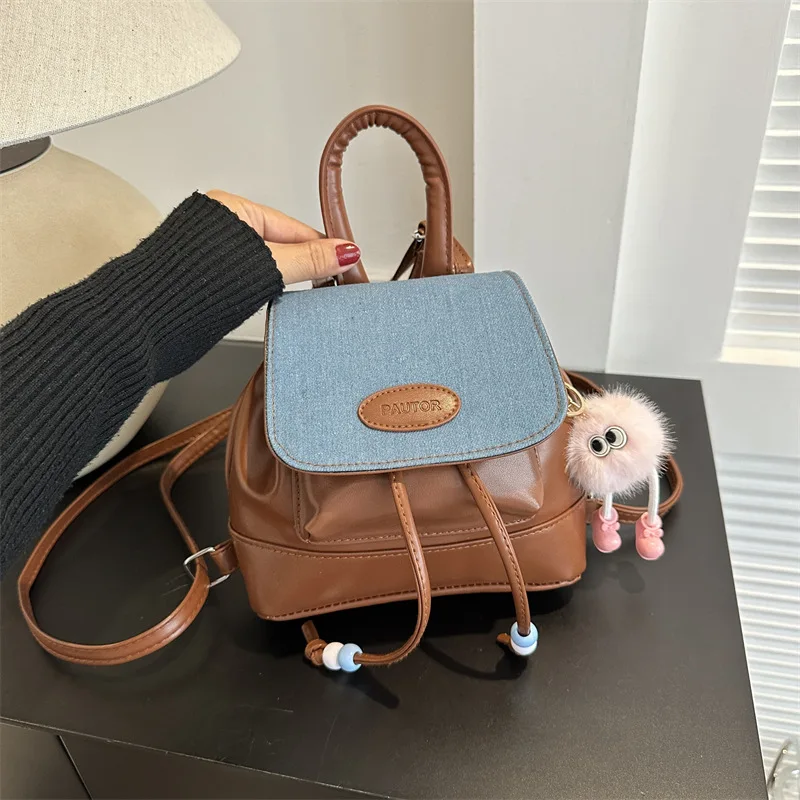 

2024 Korean Style Women's Commuter Textured Handbags with Doll Ornament Spring Summer New Versatile Retro Backpack Casual Bag