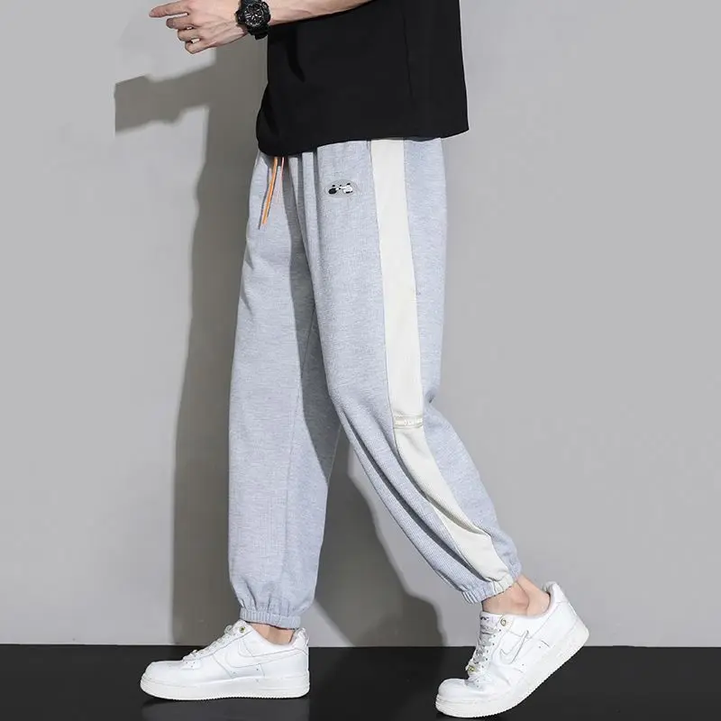 

Korean Autumn New Fashion Casual Sports Pants Men Color Blocking Printing Pockets Patchwork Drawstring Fleece Straight Trousers