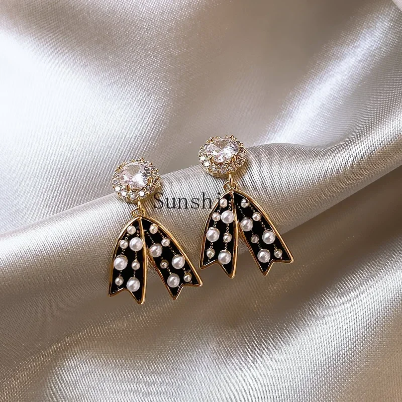 Bow pearl earrings niche design sense premium light luxury stud earrings