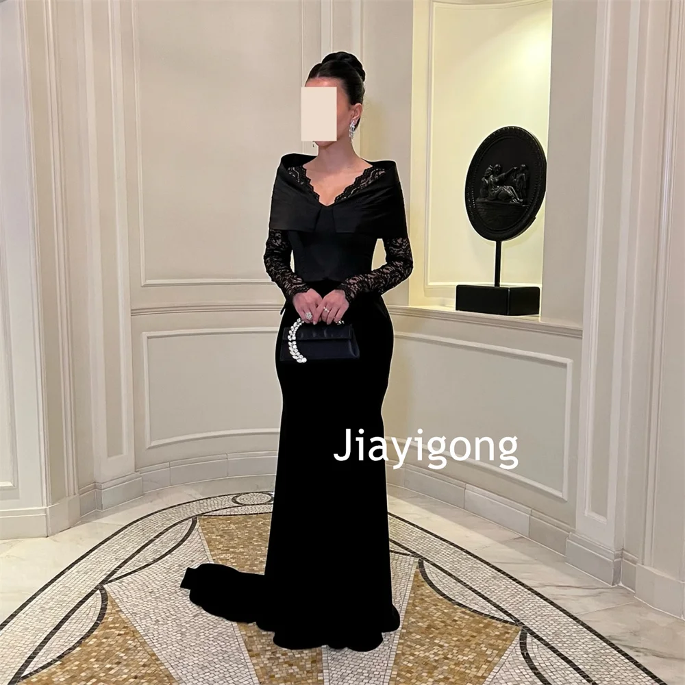 Abiti lunghi con scollo a V a sirena in pizzo con pieghe in jersey semplice personalizzato Taglie per feste su misura disponibili di alta qualità