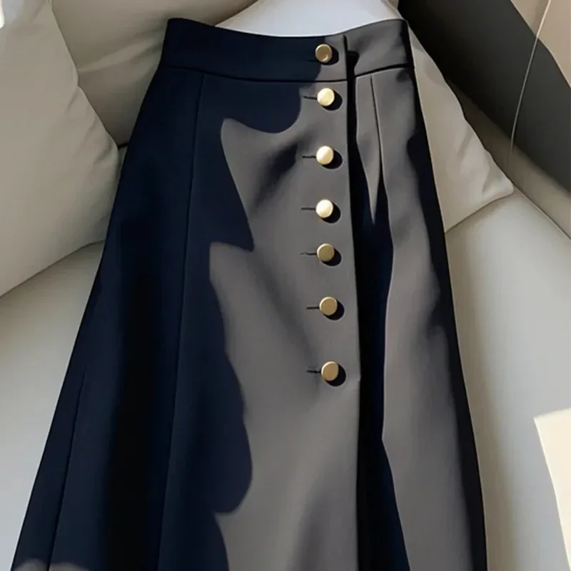 Pop Pop 2025 หญิงสูงเอวกระโปรงยาวฤดูใบไม้ผลิฤดูใบไม้ร่วงผู้หญิงกลางความยาวกระโปรงเกาหลีเลดี้แฟชั่นสีทึบชุด Max
