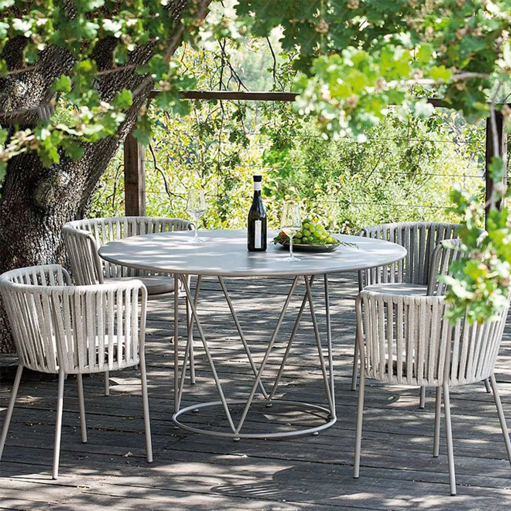 

Nordic modern leisure outdoor round table rattan chair one table four chairs rope board table courtyard balcony garden