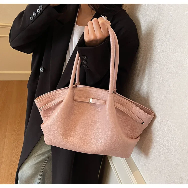 Side profile showing 'wings' silhouette and depth