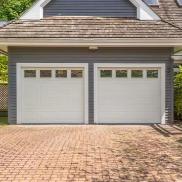 AOSTTER Automatic Sectional Garage Door With Pedestrian Door Insulated Sandwich Panel For Modern Villa And Residential Use