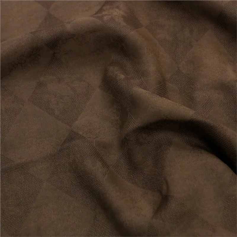 This is a designer fabric for autumn and winter pants jackets diamond-shaped checkered xiangyungauze jacquard satin