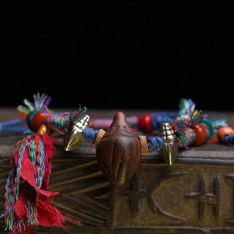 Tibetan Nangla Chak Chak Bracelet: Vintage-style, hand-woven bracelet featuring large, natural bone beads