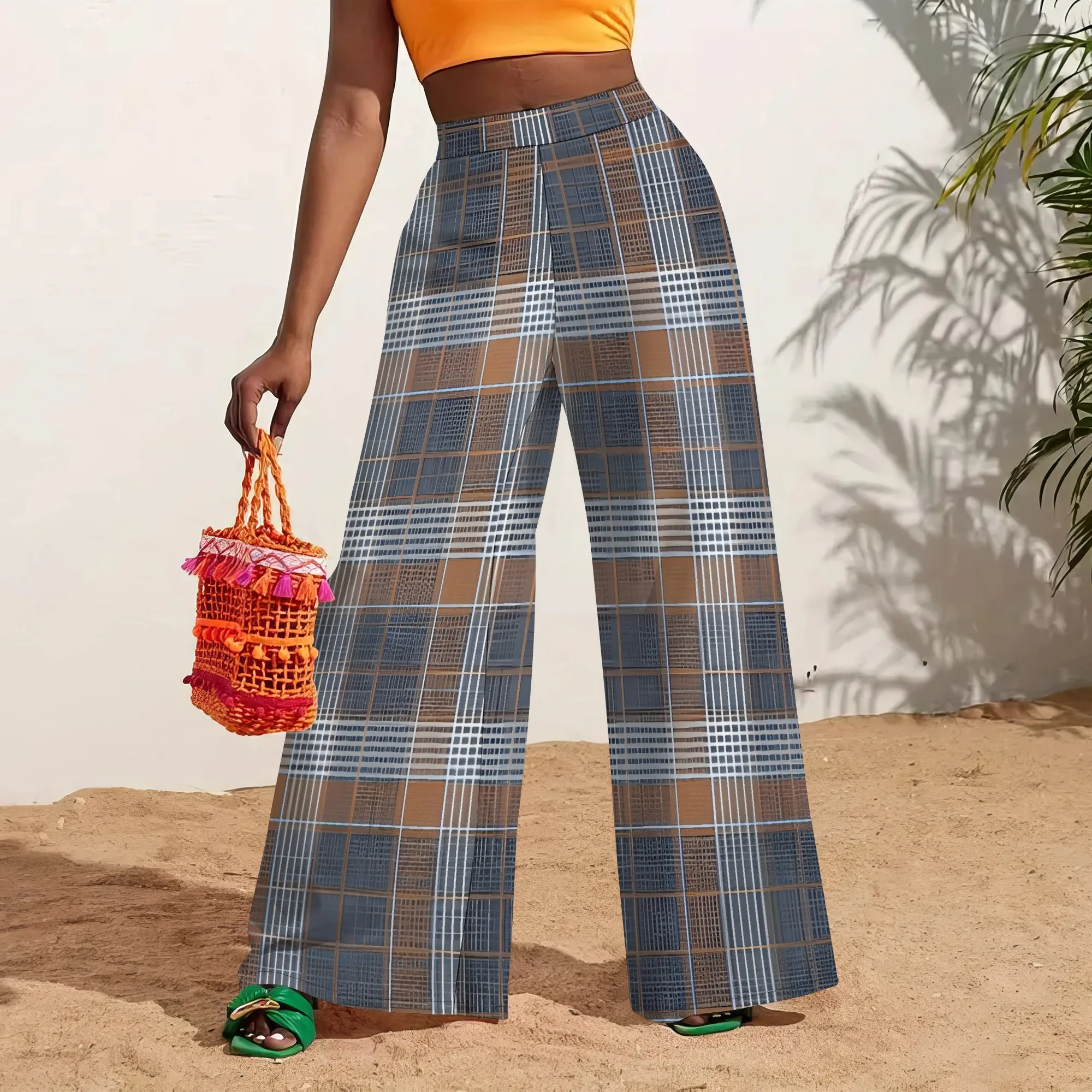 Vestido largo blanco sin mangas con estampado de líneas geométricas negras, aspecto informal elegante de verano