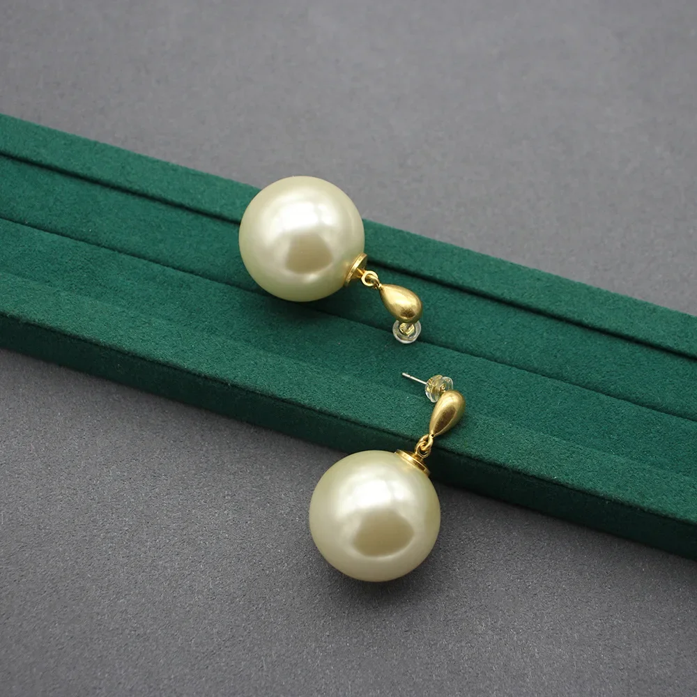 2025 New Exaggerated Table Tennis Women's Earrings Spanish Niche Designer Versatile Cotton Bead Earrings
