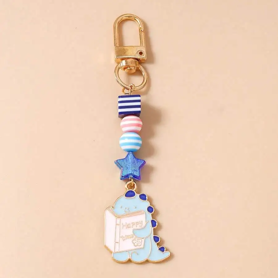 

Cartoon Dinosaur Reading Book Beaded Star Alloy Keychain Bag Charm Car Accessory