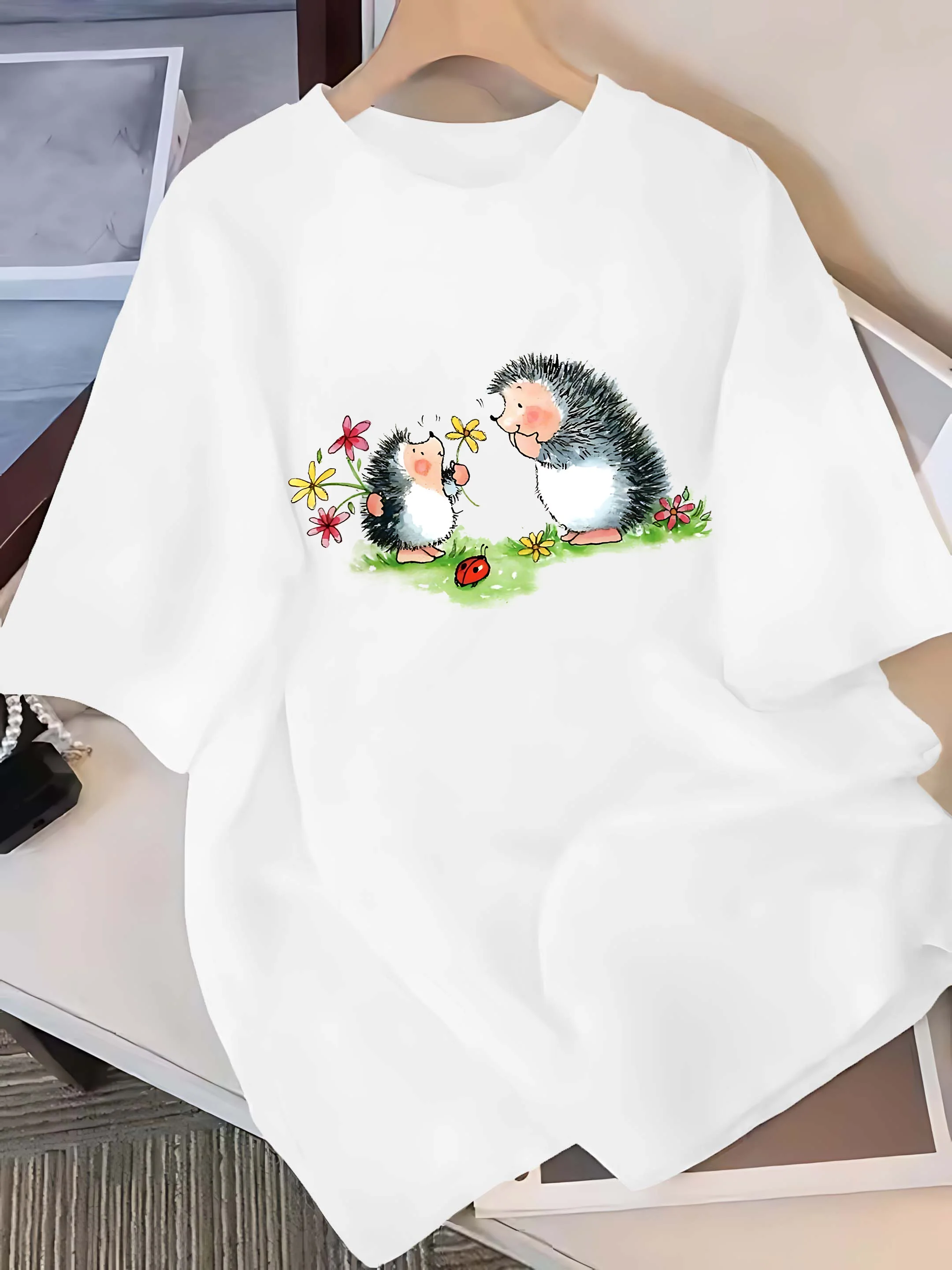 

Plus - Size Six Colour Short - Sleeve Tee: Cute Hedgehog & Flower Graphic