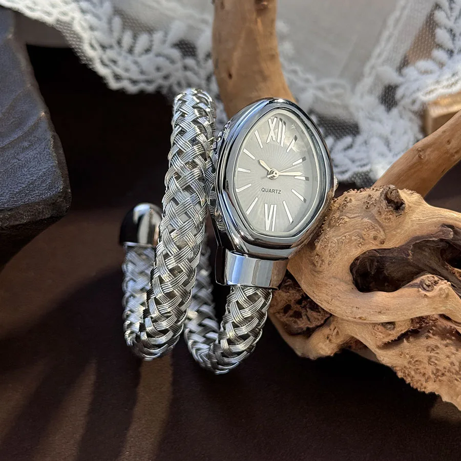 

Цельные женские модные кварцевые часы с полым стальным ремешком и змеиной головой, уникальные индивидуальные модные круглые часы