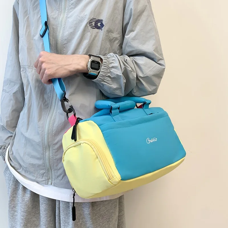 Women's Pink and Blue Color-Block Fabric Duffel Bag with Logo Print and Adjustable Strap Casual Travel Weekender Tote for Sports