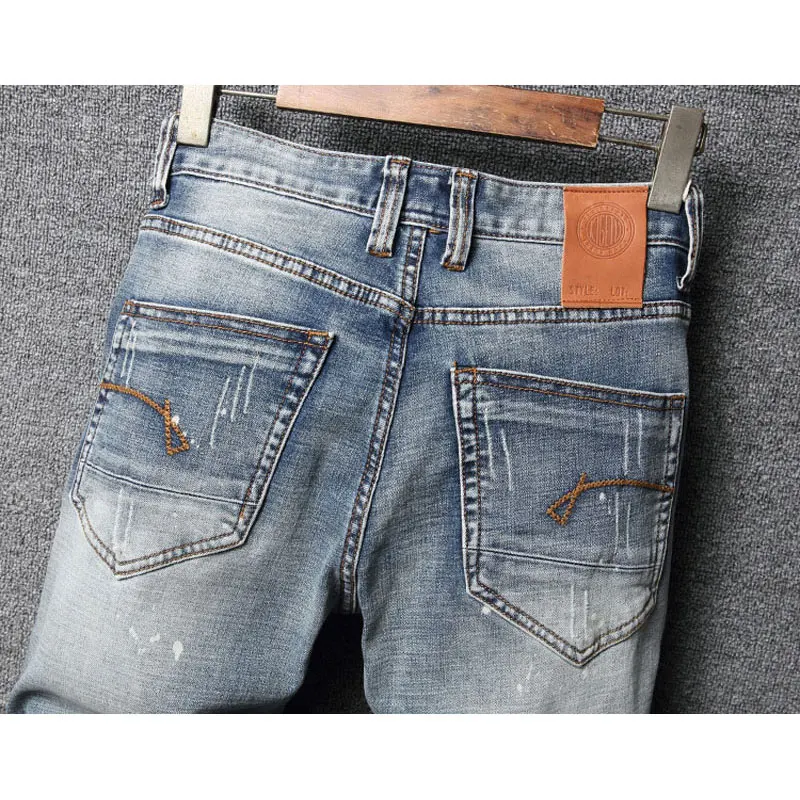 Fashion Designer Men Jeans High Quality Retro Light Blue Patched Ripped Jeans Men Elastic Stretch Vintage Denim Pants Hombre