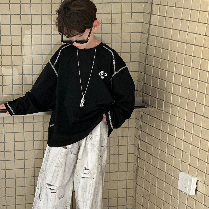 

2025 New Autumn Children's Loose and Lazy Style Solid Color Long Sleeved Cotton Hoodie with Pullover