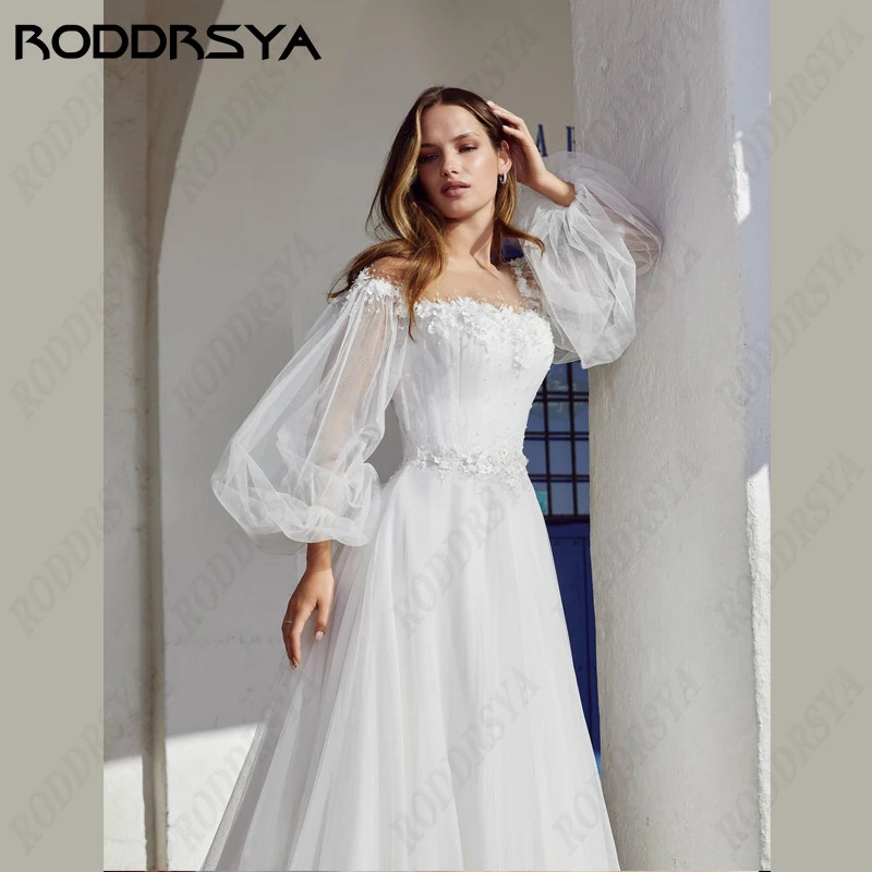 

RODDRSYA Princess Wedding Dress For Women Illusion Button Back Bridal Gown Lace Appliques Bride Party Long Sleeves A-Line Beach