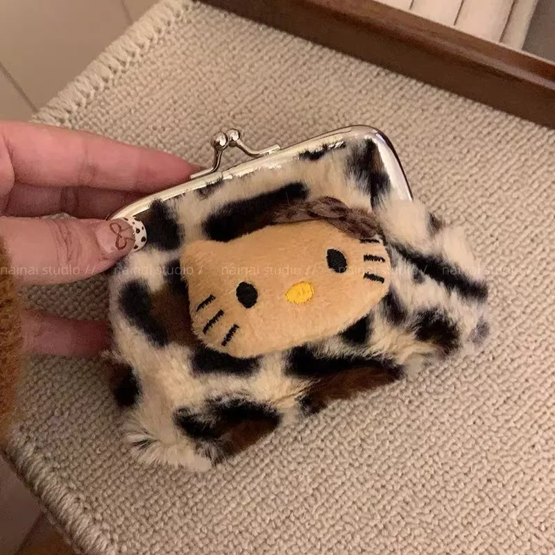 Kawaii Sanrio Hello Kitty Pelle nera con stampa leopardata Portamonete in peluche Portafoglio Borsa portaoggetti portatile per auricolari Regali di compleanno per ragazze