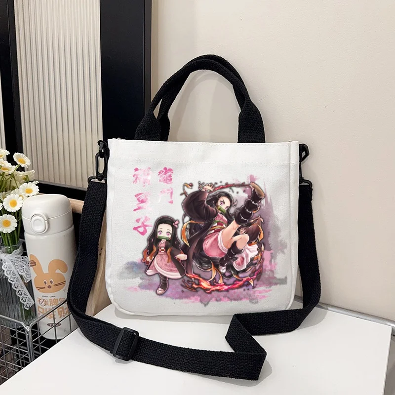 アニメデーモンスレイヤーショルダークロスボディバッグ漫画フィギュアプリントキャンバスバッグファッションミニマリスト多機能ハンドバッグギフト