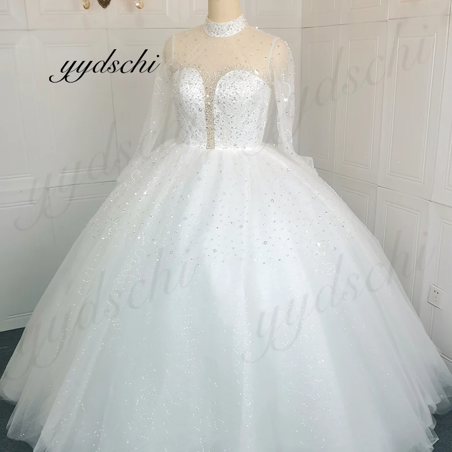 

High Neck Crystal Wedding Dresses 2023 Luxury Tulle Appliques Beading Bridal Ball Gown Princess Long Sleeves Court Train Pearl