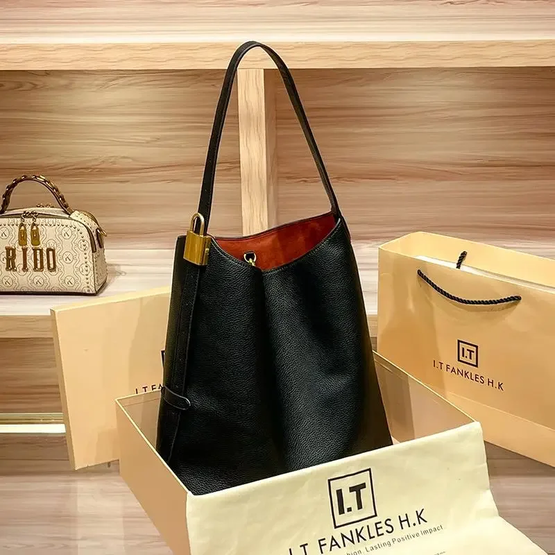 Hong Kong leather popular bucket bag women 2025 new spring and summer large-capacity commuter tote bag crossbody shoulder bag