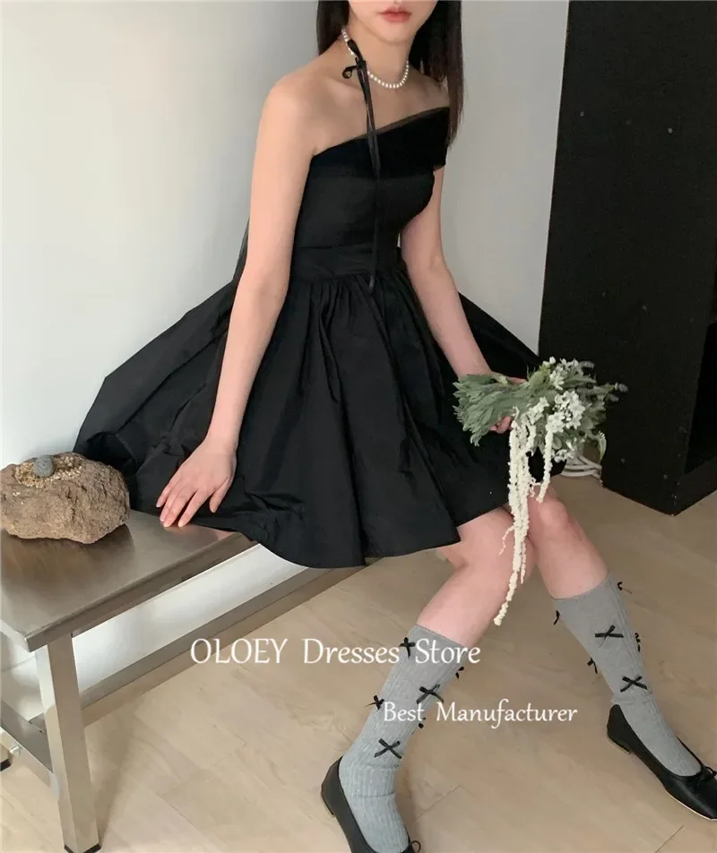 فساتين OLOEY بسيطة على شكل حرف A سوداء قصيرة للحفلات الراقصة لحفلات الزفاف الكورية بدون حمالات فستان كوكتيل صغير من التفتا صيفي