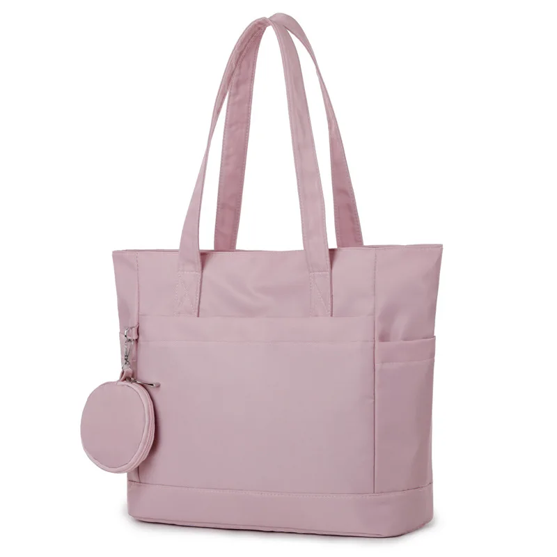 

New Minimalist Nylon Tote Bag - Spacious Commuter Backpack with A Single Shoulder Strap and Multi-functional Waterproof Feature.
