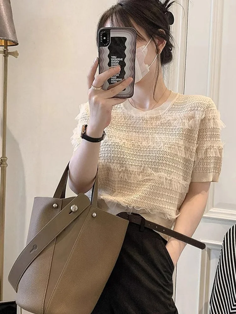 

Hollow Knitted ort Sve round Ne T-irt Me Splicing Base irt Korean Sle Commute Wind Summer New Faion Women's Top