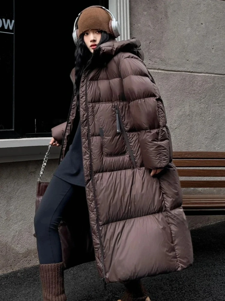 Femmes nouveau automne hiver épaissi chaud vers le bas vêtements dame longue à capuche moelleux doudoune mode décontracté vers le bas manteau femme 2025