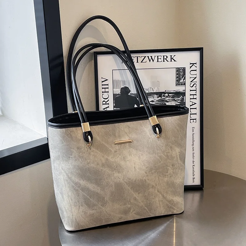 

Wholesale New Products Niche Simple Style Design Sense Large Capacity Tote Bag Commuter Versatile Shoulder Bag Women