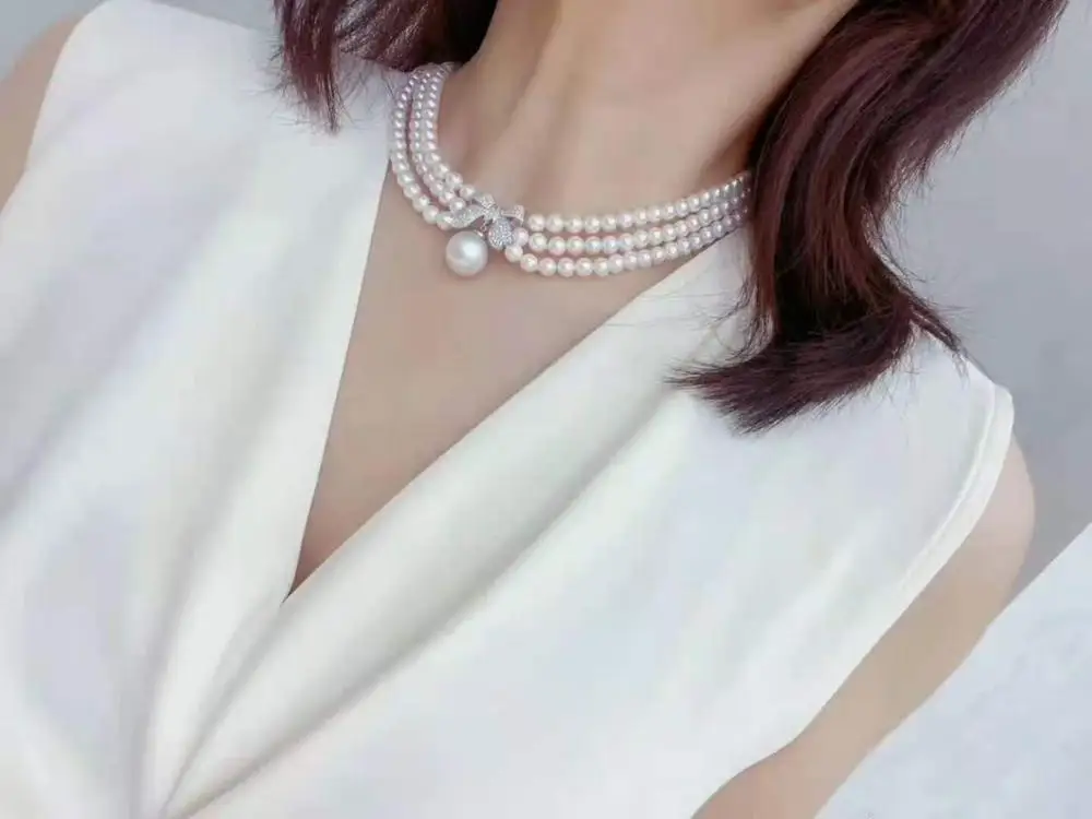 Hand knotted 3 rows 43-47cm 5-6mm white nearly round freshwater pearl bowknot micro inlay zircon necklace fashion jewelry