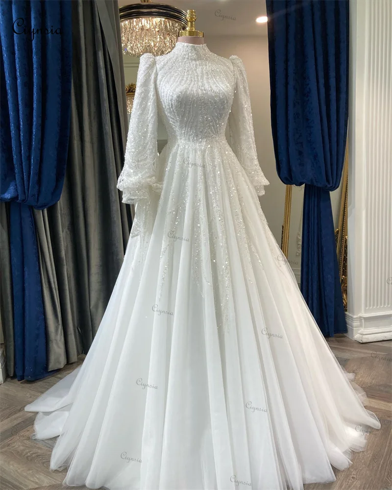 Ciynsia Luxury maniche lunghe abiti da sposa musulmani in rilievo di pizzo Dubai abiti da sposa arabi per le donne sposa Robe De Mariée 2024