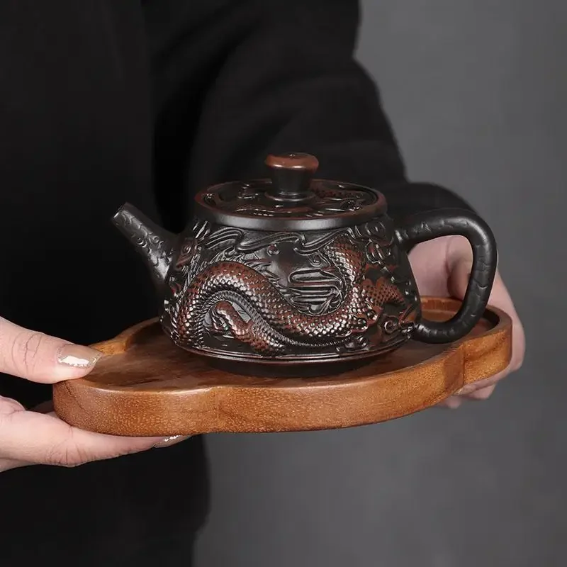 Rotating upside-down aircraft kettle fully carved handmade purple pottery teapot Kung Fu tea set Fengming kettle Xishi teapot