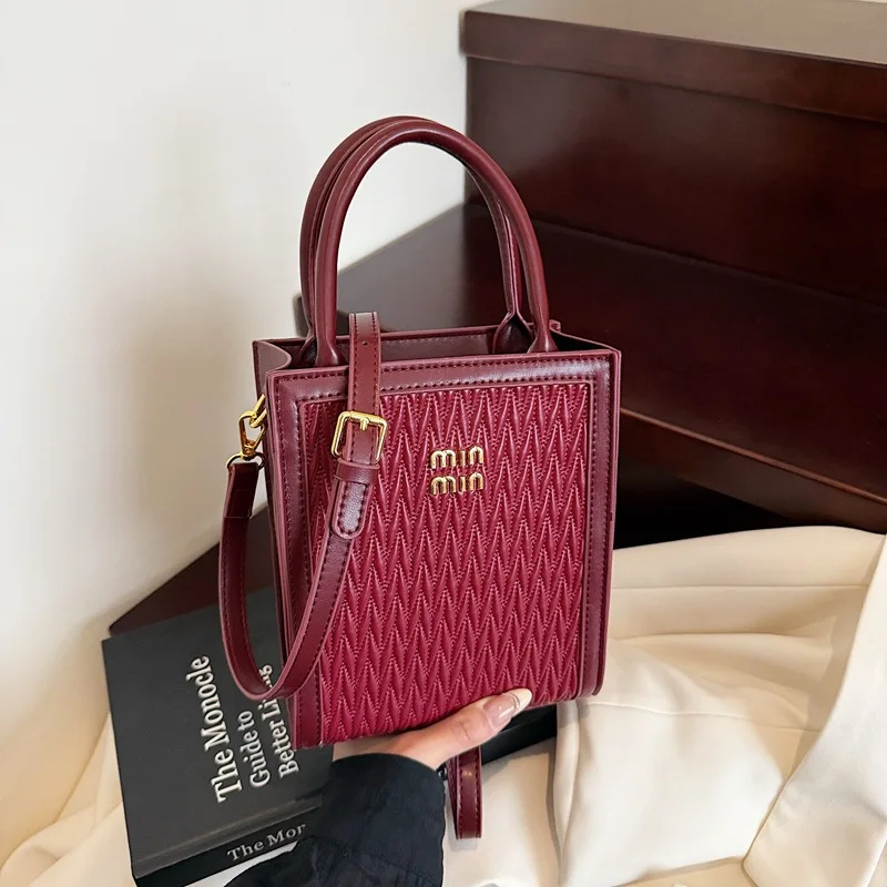 2025ミニスクエアバッグ 韓国風クロスボディバッグ レディース 高級トートバッグ 取り外し可能なコインパース付き