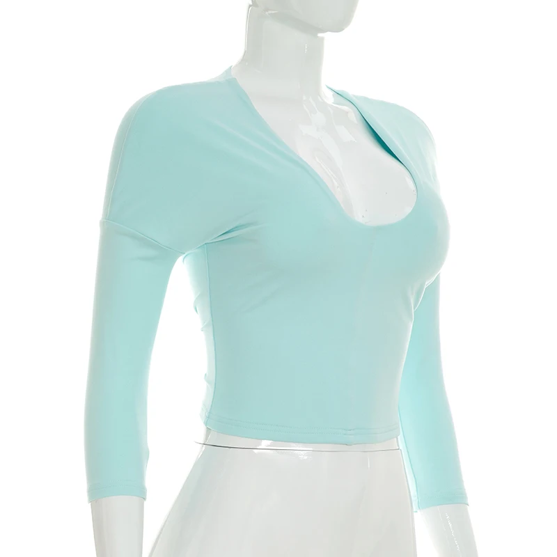 Sexy, schmal geschnittenes, einfarbiges Oberteil mit tiefem Ausschnitt, sieben Viertelärmeln und Patchwork-Details, das die Taille betont. – Detail 9
