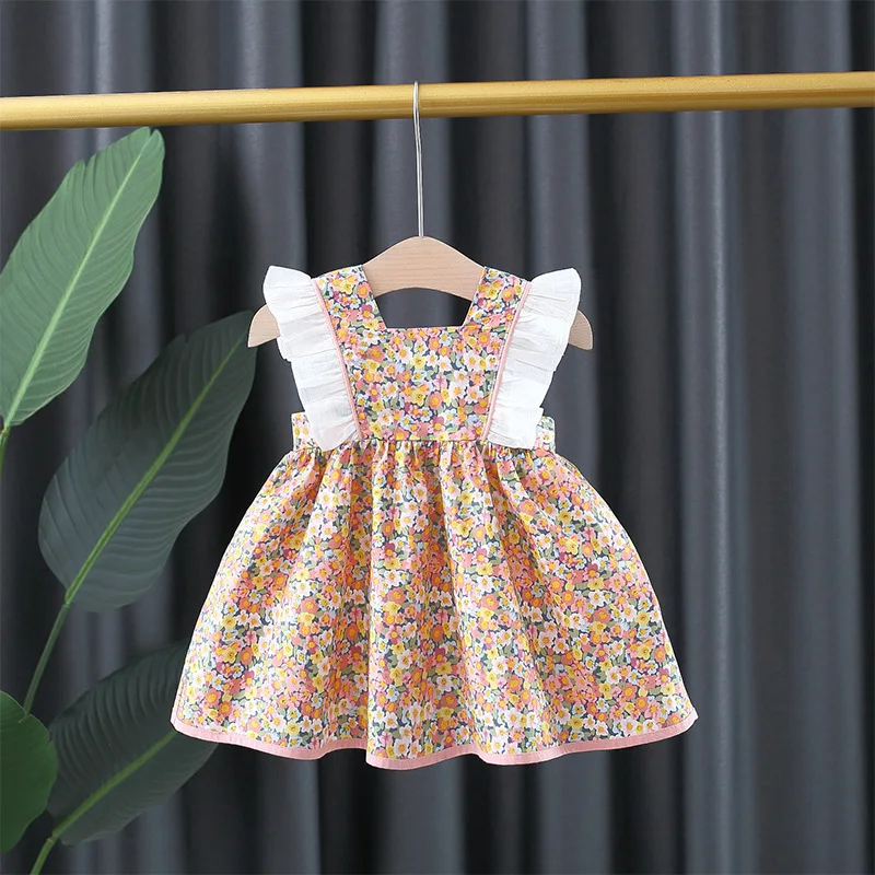 Baby Girls Floral Print Princess Dress With White Lace On The Sides And A Big Bow In The Back