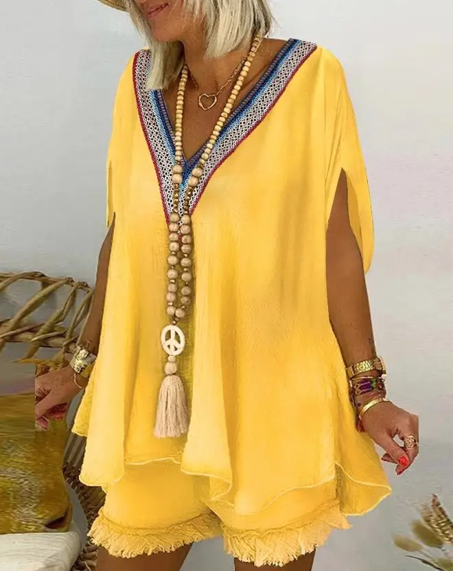 

Women's Two Piece Casual Summer V-Neck Contrast Paneled Lace Patch Fringe Flowy Batwing Sleeve Top and Tassel Design Shorts Set
