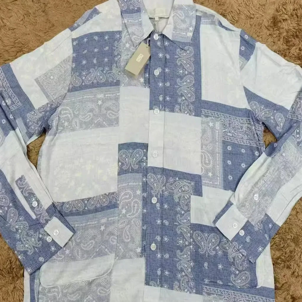 

Легкая шелковая рубашка-жакет Kith с узором «Цветы грецкого ореха», отложным воротником, длинными рукавами, охлаждающим эффектом и свободным кроем.