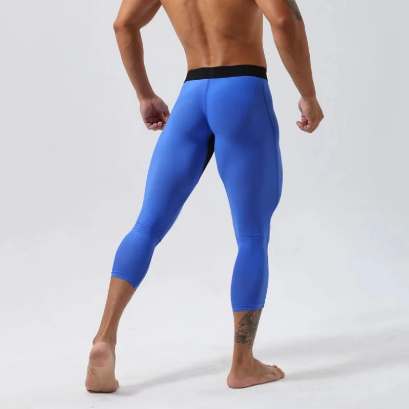 مثير رجل اللياقة البدنية زائد حجم Sweatpants 3/4 السراويل مرونة عالية النمط الأمريكي السراويل سكيت السراويل الرياضية الطويلة