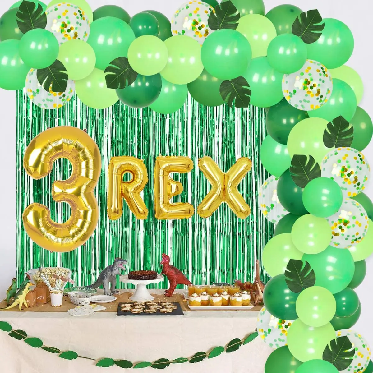 

JOYMEMO Dinosaur 3rd Birthday Decorations for Boys Green Balloon Garland Kit 3 REX Foil Balloons Artificial Leaves Green Curtain