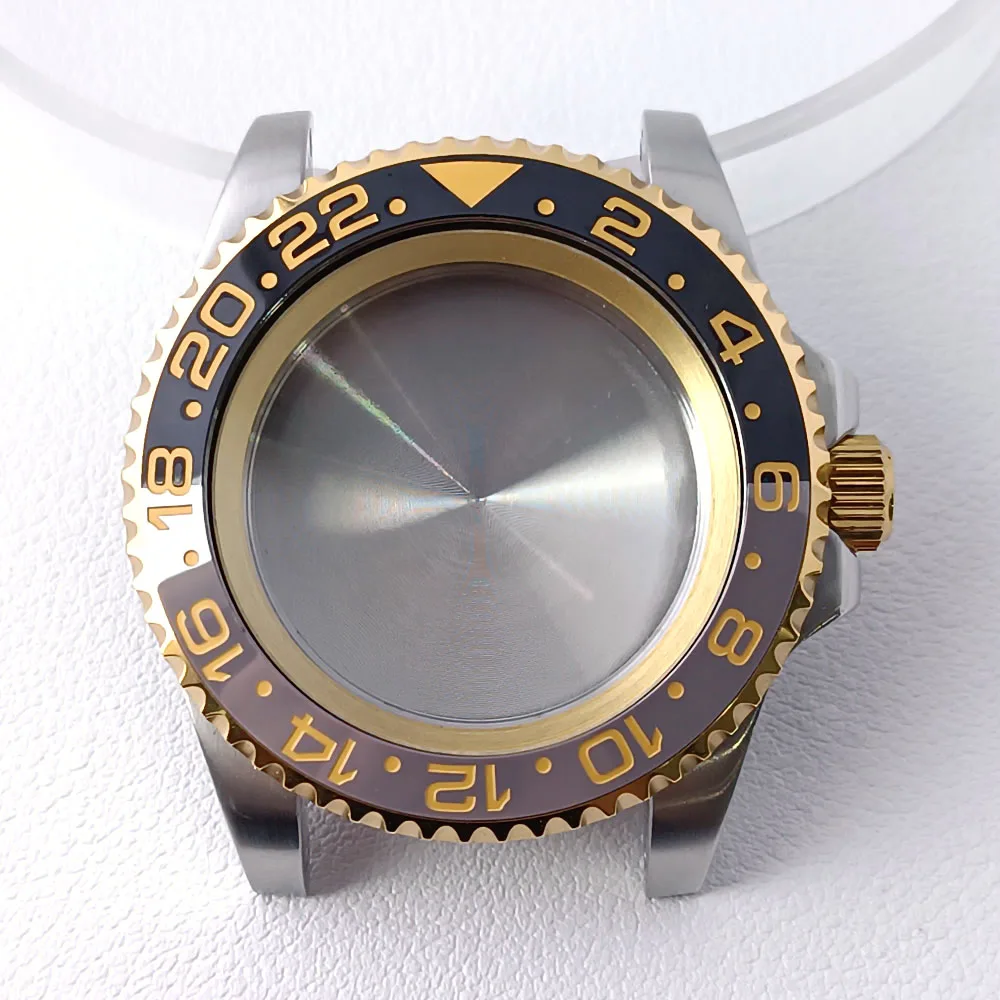 

40,5 мм, высококачественный корпус серебристого золота/розового цвета GMT с кольцом из нержавеющей стали, водонепроницаемые аксессуары, механизм NH34 NH35 NH36